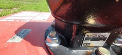 Heavy-duty red Bush Hog 3008-2 8′ rotary cutter.