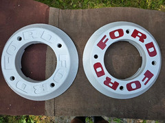 Ford tractor wheel weights 65 # x 4. Cleaned prepped, primed, painted white….