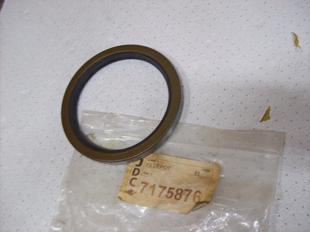 F7) Depot Genuine OEM NOS Seal 7175876 (with a touch of rust)