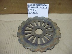 International Used Cast Iron Planter Seed Plate, Sold By the Piece