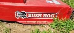 Heavy-duty red Bush Hog 3008-2 8′ rotary cutter.