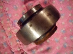 John Deere Bearing. NOS. 1 1/8″ inside diameter. 2 1/4″ outside diameter.