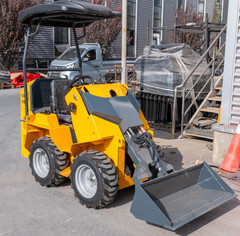 NEW Mini Wheel Type Skid Steer Loader Riding Skid Machine 13.5HP EPA For Sale