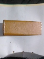 Orange -Yellow Black cat mini excavator tooth size: Serial number 1U3202 