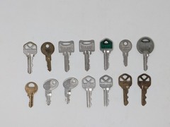 Miscellaneous lot of house trailer padlock keys 14 total